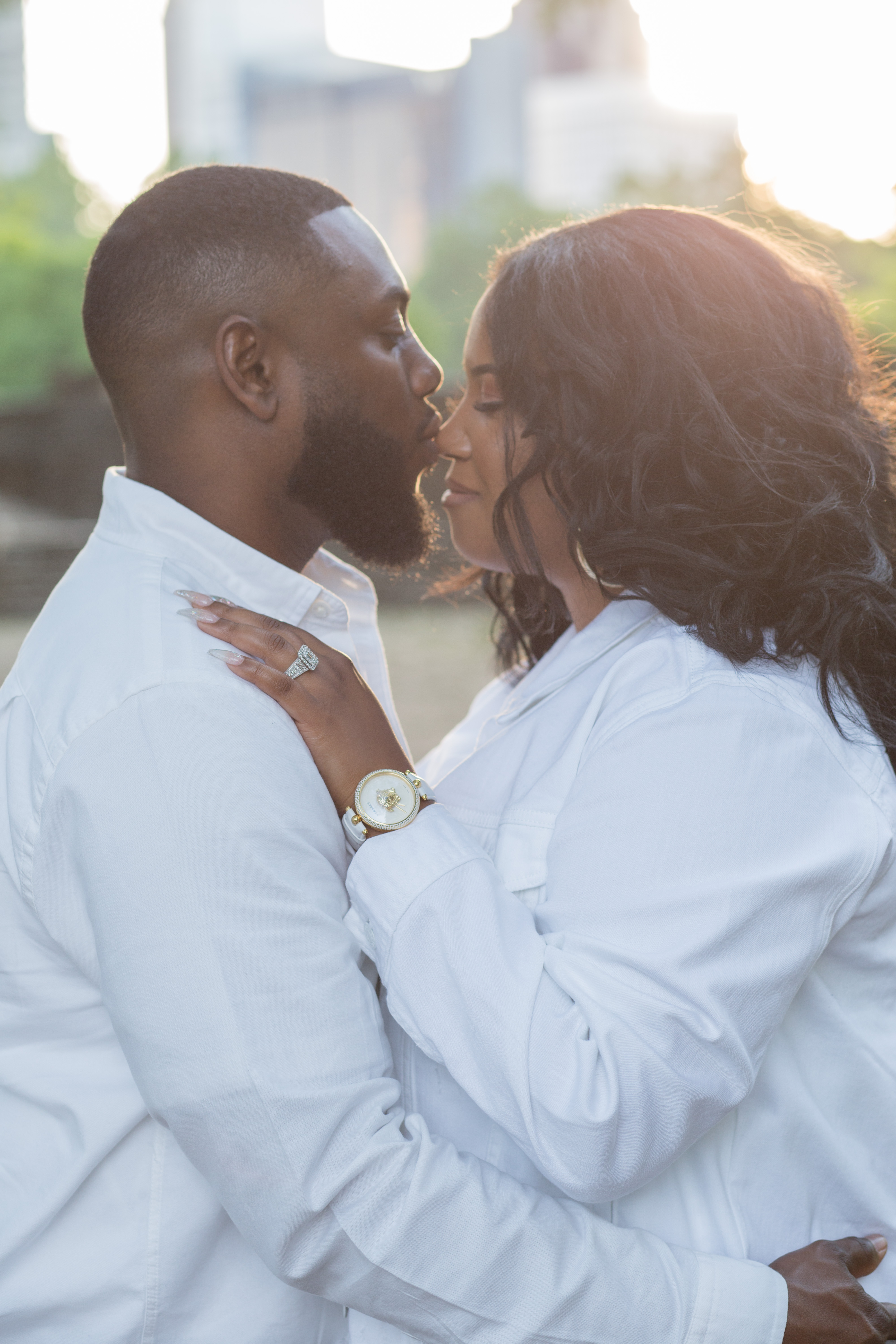 As he gently kissed her during their engagement session